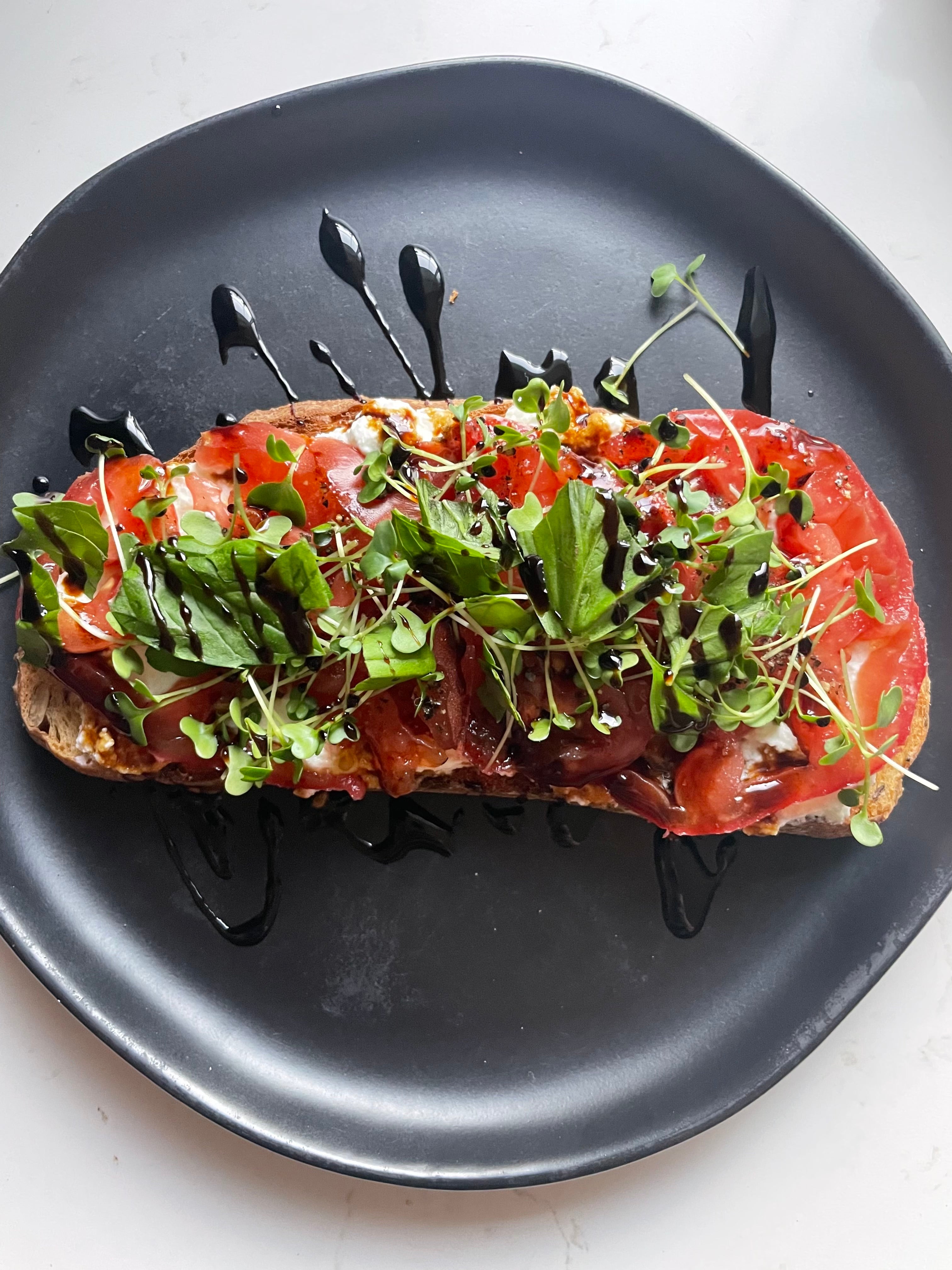 Ricotta and Tomato Toast with Microgreens and Basil